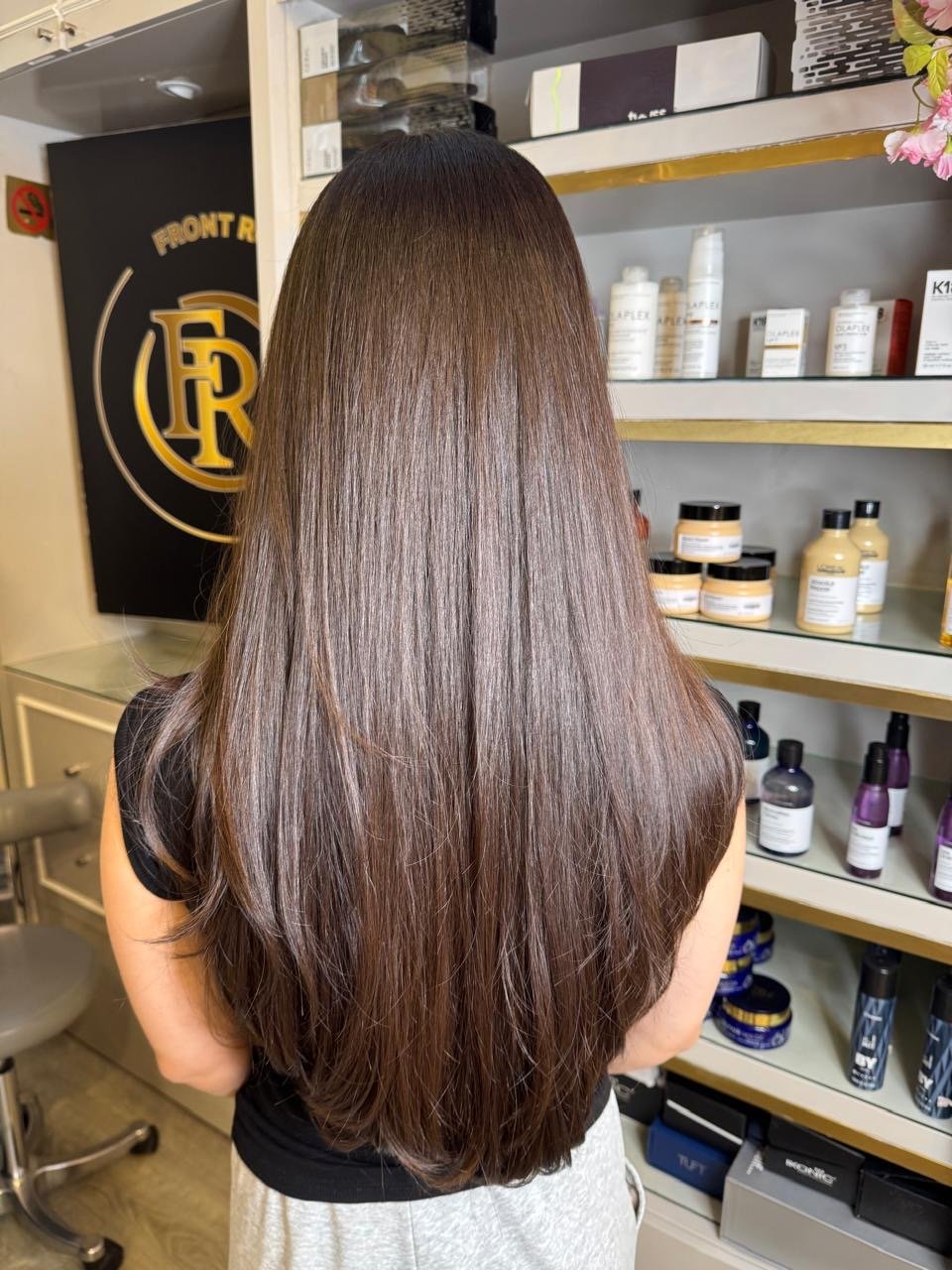 Sleek straight finish at Front Row Beauty Salon