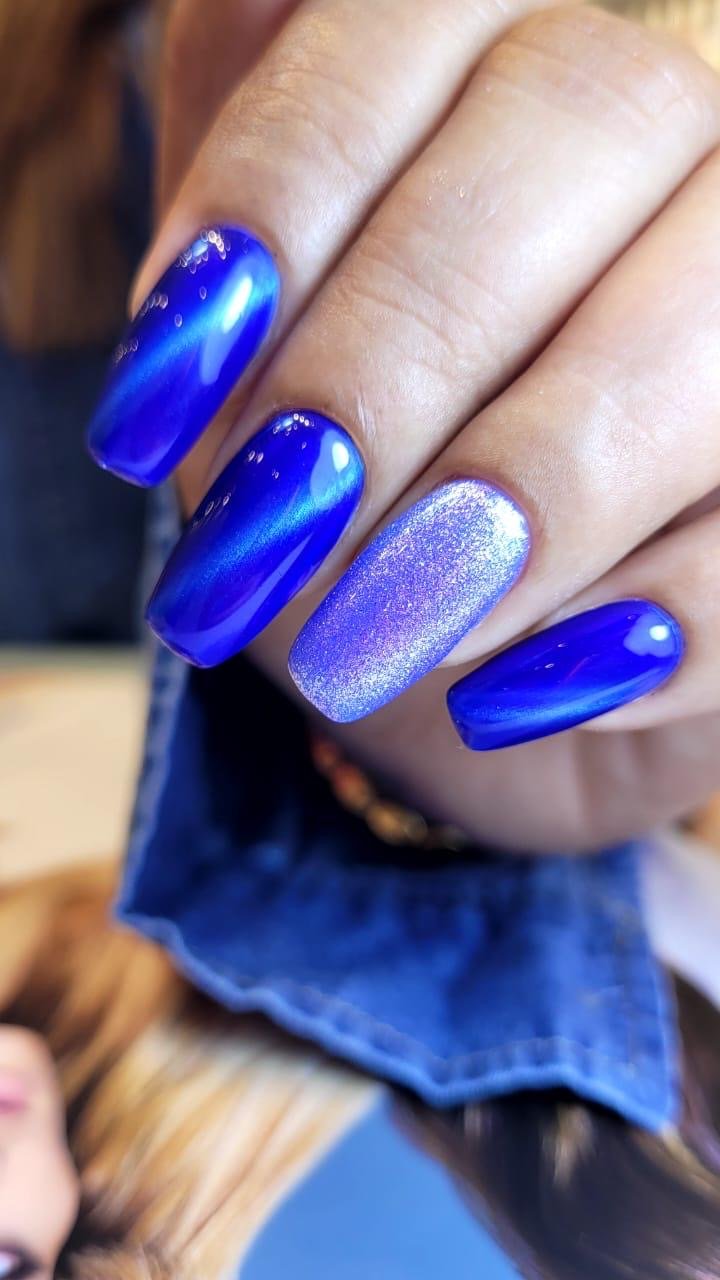 Chrome blue nail art at Front Row Beauty Salon